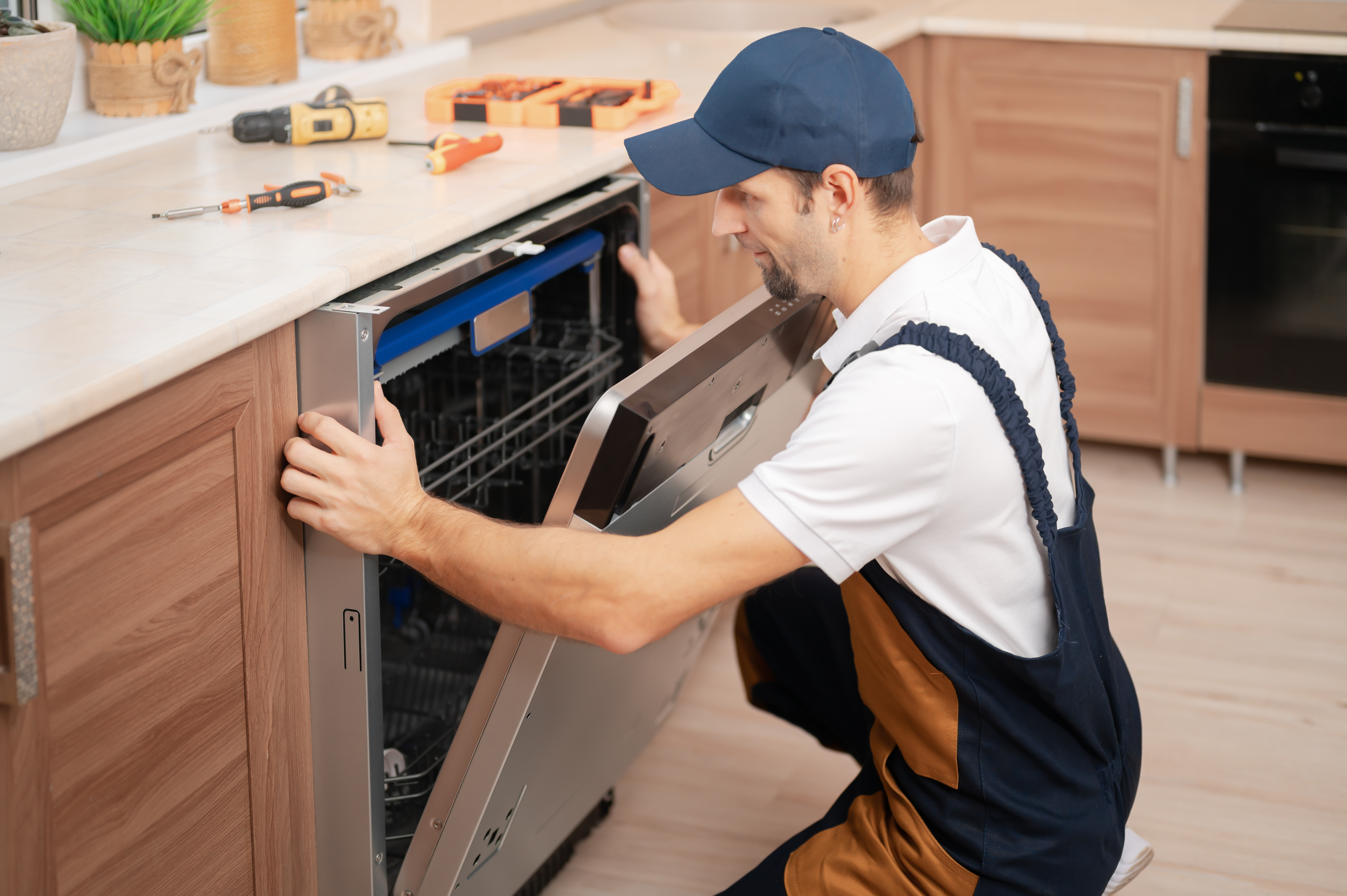 A WyattWorks service provider installing a dishwasher in Mooresville / Huntersville, NC services.