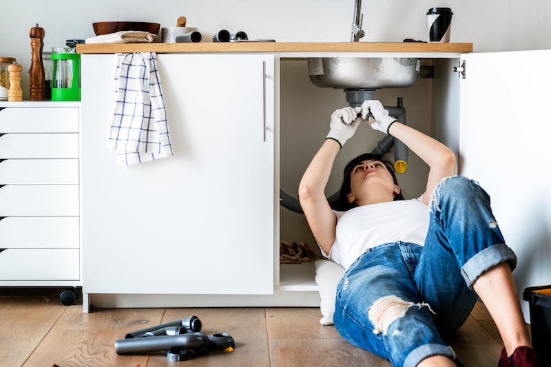 An image of homeowner doing DIY maintenance in Ohio & North Carolina.