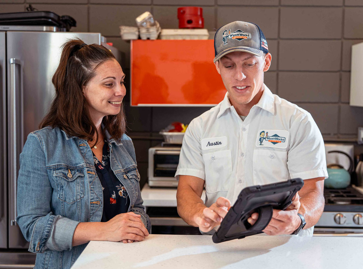 A WyattWorks expert speaking to a customer about their service.