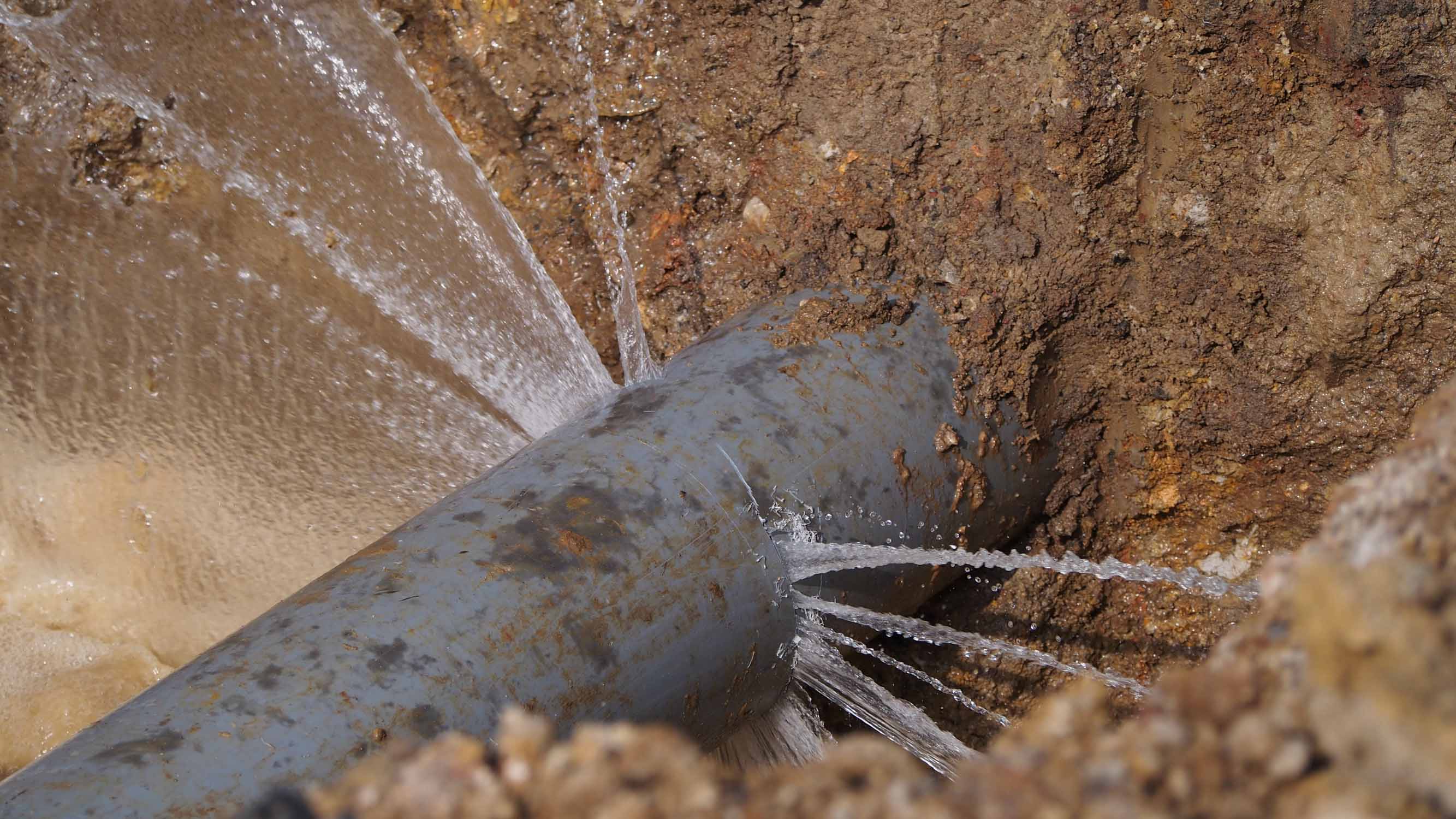 A pipe in the ground leaking into the dirt, call WyattWorks for your Ohio & North Carolina plumbing excavation in Ohio & North Carolina.