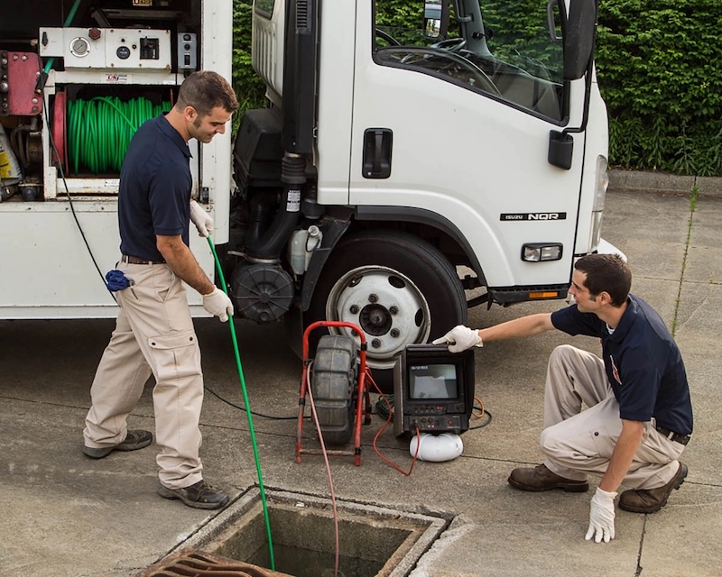 A an image of WyattWorks employees working on excavation - contact WyattWorks for expert plumbing excavation in Seven Hills, OH.