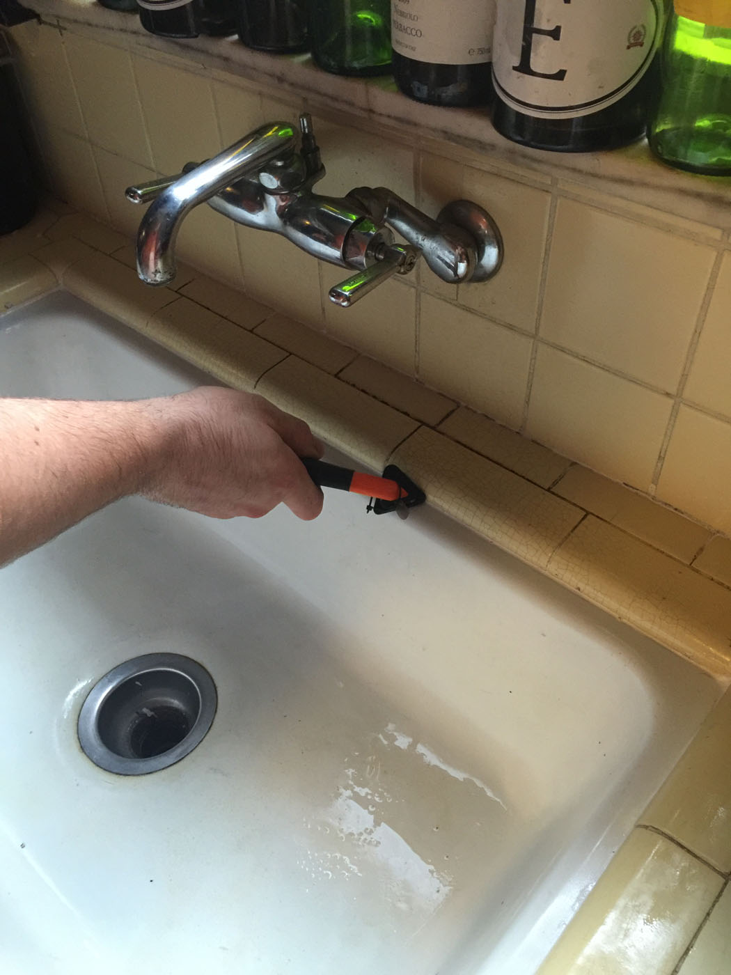 service pro working on a drain WyattWorks Cleveland West Side, OH