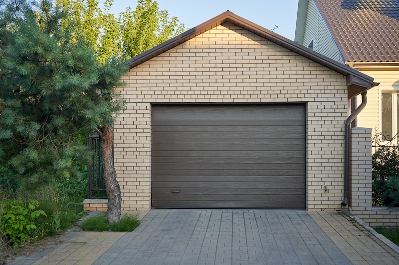 The front view of a residential garage - for plumbing services for garages in Huntersville, NC, call WyattWorks.