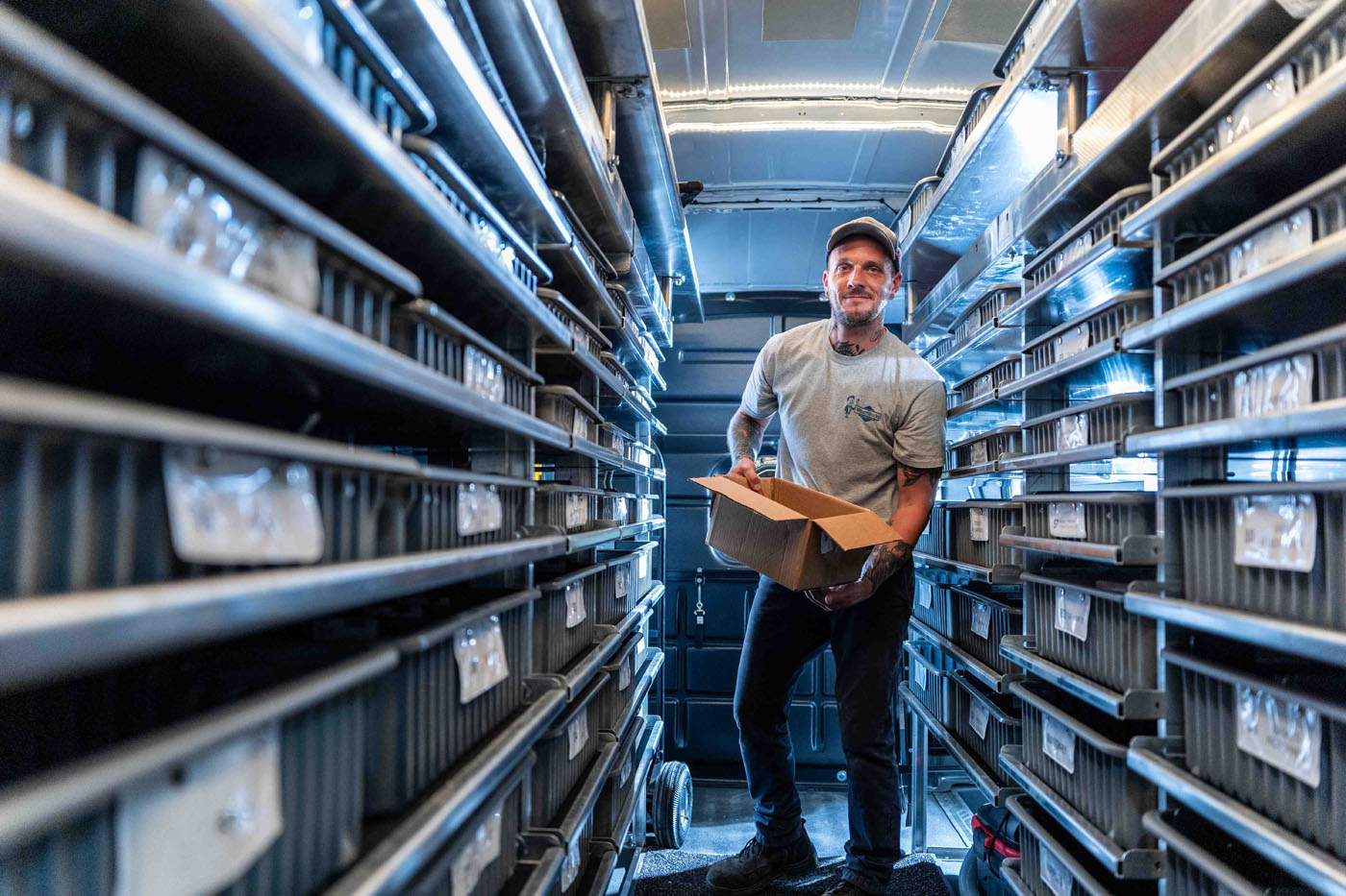 A WyattWorks team member in a storage unit - call for trusted leak detection in Seven Hills, OH.